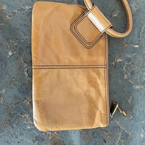 HOBO brand genuine leather wallet w/wrist attachment.  Zip closure.  Never used